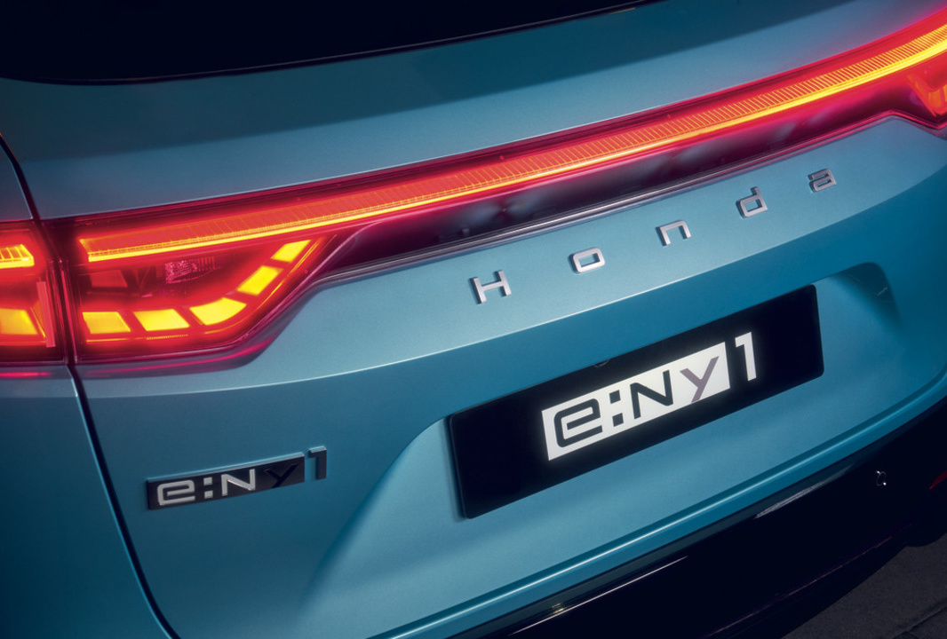 brake details on the back of a blue Honda e:Ny1